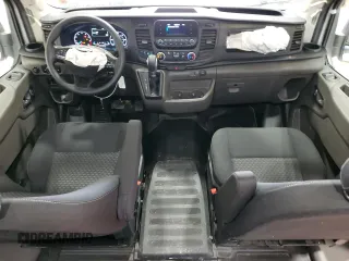 2023 Ford Transit Cargo с VIN 1FTYE1C81PKB87307, выставлен на аукционе Copart как лот 82114314 с пробегом 11 103 миль миль и Списание • Salvage title. История ставок и продаж доступна на DreamBid. Изображение 8.