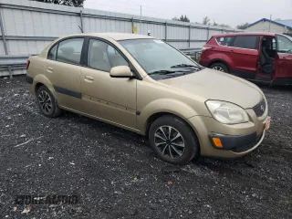 2009 Kia Rio LX with VIN KNADE223096485561, listed as a Copart auction lot 73412874 with 137,858 mi miles and Salvage Title. Bid and sale history available at DreamBid. Image 4.