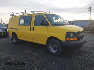 2014 Chevrolet Express Cargo Van with VIN 1GCWGFCA7E1150041, listed as a IAAI auction lot 41387426 with 185,480 mi miles. Bid and sale history available at carsss.com. Image 1.