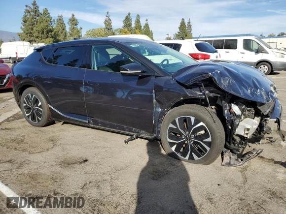 2023 Kia EV6 Wind with VIN KNDC34LA9P5602084, listed as a Copart auction lot 77227004 with 40,630 mi miles and Salvage Title. Bid and sale history available at carsss.com. Image 4.