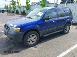 2005 Ford Escape XLT with VIN 1FMYU93195KA35708, listed as a IAAI auction lot 42130239 with 230,920 mi miles. Bid and sale history available at carsss.com. Image 2.