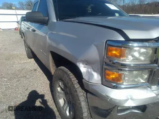 2014 Chevrolet Silverado 1500 LT with VIN 1GCVKREC7EZ120159, listed as a IAAI auction lot 41191282 with 206,836 mi miles and . Bid and sale history available at DreamBid. Image 17.