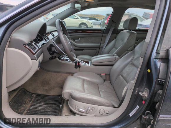 2004 Audi A8 with VIN WAUML44E04N021359, listed as a Copart auction lot 63251205 with 68,626 mi miles and Salvage title. Bid and sale history available at DreamBid. Image 7.