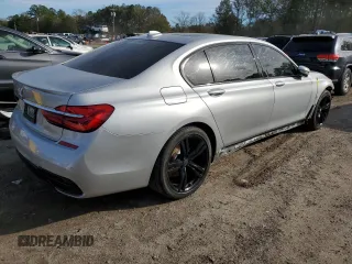 2017 BMW 7 Series 740i with VIN WBA7E2C59HG739984, listed as a Copart auction lot 37475514 with 54,841 mi miles. Bid and sale history available at carsss.com. Image 3.