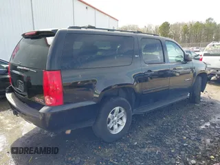 2014 GMC Yukon XL SLT with VIN 1GKS2KE77ER199723, listed as a IAAI auction lot 41555112 with 215,436 mi miles. Bid and sale history available at carsss.com. Image 4.