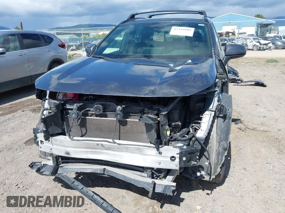 2022 Toyota RAV4 Hybrid SE with VIN JTM16RFV0ND070012, listed as a IAAI auction lot 42244604 with 22,740 mi miles and . Bid and sale history available at DreamBid. Image 6.