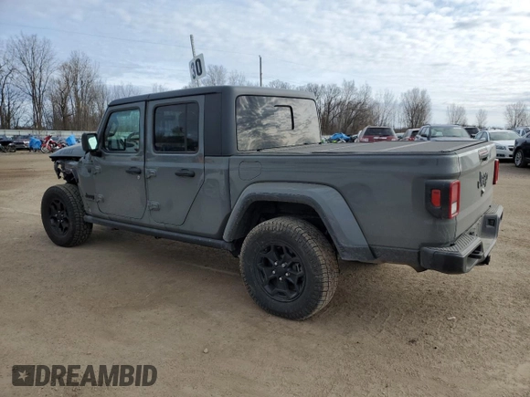 2023 Jeep Gladiator Willys z VIN 1C6HJTAG0PL507803, wystawiony jako Copart lot #48526875 z przebiegiem 51 811 mil mil oraz Czysty tytuł • Clean title. Historia ofert i sprzedaży dostępna na DreamBid. Obrazek 2.