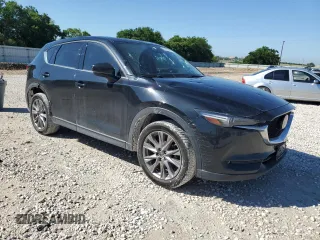 2019 Mazda CX-5 Grand Touring with VIN JM3KFBDM7K0563198, listed as a Copart auction lot 54723494 with 132,126 mi miles and Clean Title. Bid and sale history available at carsss.com. Image 4.