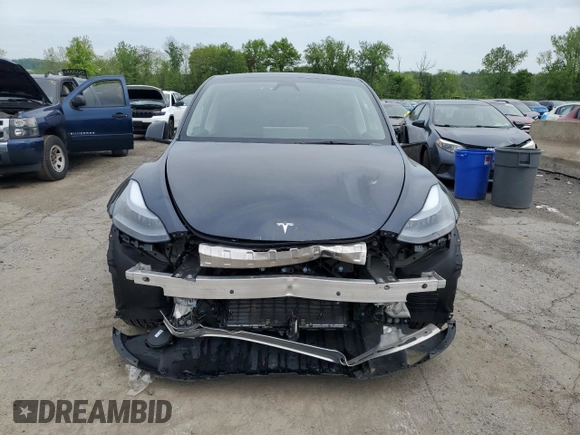 2024 Tesla Model Y Long Range с VIN 7SAYGDEE3RA328991, выставлен на аукционе Copart как лот 56637455 с пробегом Не указан миль и Списание • Salvage title. История ставок и продаж доступна на DreamBid. Изображение 5.
