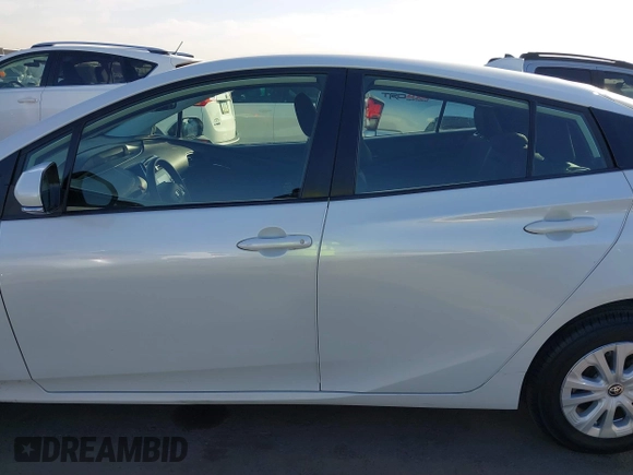2021 Toyota Prius L Eco with VIN JTDKAMFU7M3133544, listed as a IAAI auction lot 41548653 with 115,214 mi miles and . Bid and sale history available at DreamBid. Image 15.