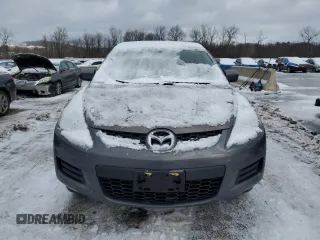 2009 Mazda CX-7 Grand Touring z VIN JM3ER29L990221136, wystawiony jako Copart lot #45233915 z przebiegiem 156 676 mil mil oraz Czysty tytuł • Clean title. Historia ofert i sprzedaży dostępna na DreamBid. Obrazek 5.