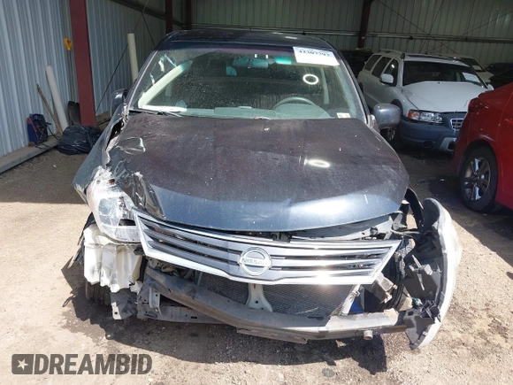 2011 Nissan Versa S z VIN 3N1BC1CP5BL500520, wystawiony jako IAAI lot #42307793 z przebiegiem 127 281 mil mil oraz . Historia ofert i sprzedaży dostępna na DreamBid. Obrazek 13.