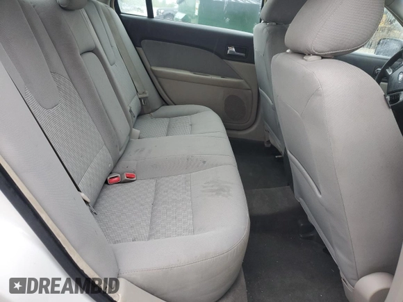 2012 Ford Fusion SE z VIN 3FAHP0HA4CR185059, wystawiony jako Copart lot #56875985 z przebiegiem 173 644 mil mil oraz Nie do naprawy. Historia ofert i sprzedaży dostępna na DreamBid. Obrazek 10.