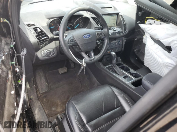 2018 Ford Escape Titanium with VIN 1FMCU9J95JUB31286, listed as a Copart auction lot 58721355 with 100,329 mi miles and Salvage title. Bid and sale history available at DreamBid. Image 8.