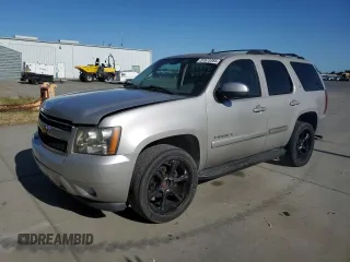2007 Chevrolet Tahoe LT z VIN 1GNFC13J17J145992, wystawiony jako Copart lot #57673385 z przebiegiem 151 804 mil mil oraz Szkoda całkowita • Salvage title. Historia ofert i sprzedaży dostępna na DreamBid. Obrazek 1.