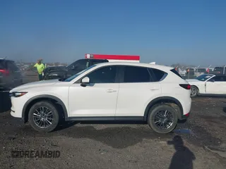2019 Mazda CX-5 Touring z VIN JM3KFACM0K1564330, wystawiony jako IAAI lot #41797276 z przebiegiem 112 100 mil mil oraz . Historia ofert i sprzedaży dostępna na DreamBid. Obrazek 14.