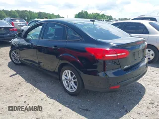 2016 Ford Focus SE with VIN 1FADP3F29GL256160, listed as a IAAI auction lot 42188124 with 72,868 mi miles and . Bid and sale history available at DreamBid. Image 3.