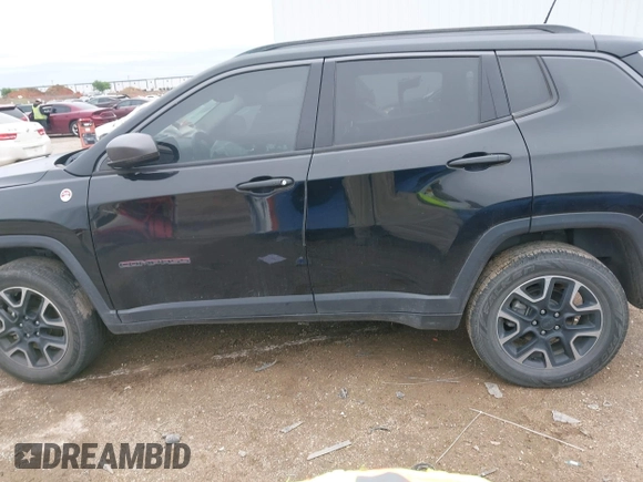 2019 Jeep Compass Trailhawk z VIN 3C4NJDDB5KT618149, wystawiony jako IAAI lot #41959320 z przebiegiem 99 795 mil mil oraz . Historia ofert i sprzedaży dostępna na DreamBid. Obrazek 14.
