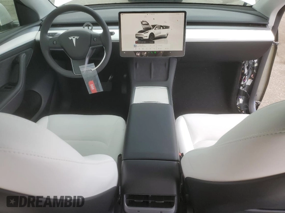 2023 Tesla Model Y Long Range z VIN 7SAYGDEE3PF916132, wystawiony jako Copart lot #51645625 z przebiegiem 28 238 mil mil oraz Szkoda całkowita • Salvage title. Historia ofert i sprzedaży dostępna na DreamBid. Obrazek 8.