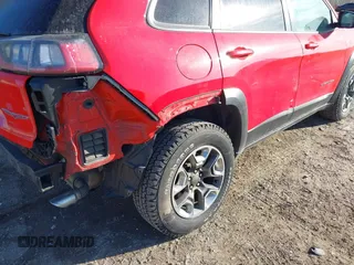 2019 Jeep Cherokee Trailhawk Elite with VIN 1C4PJMBX3KD217437, listed as a IAAI auction lot 41448614 with 85,889 mi miles. Bid and sale history available at carsss.com. Image 17.