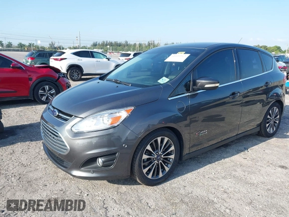 2017 Ford C-Max Energi Titanium with VIN 1FADP5FU9HL117693, listed as a IAAI auction lot 42059763 with 86,827 mi miles. Bid and sale history available at carsss.com. Image 18.