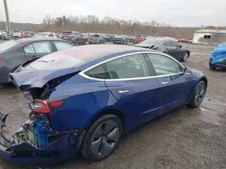 2018 Tesla Model 3 Long Range Battery with VIN 5YJ3E1EA9JF022782, listed as a IAAI auction lot 41875429 with 79,209 mi miles. Bid and sale history available at carsss.com. Image 4.