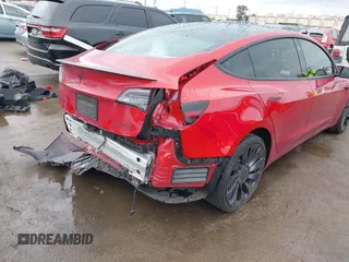 2021 Tesla Model 3 Performance with VIN 5YJ3E1EC5MF050598, listed as a IAAI auction lot 41778169 with 74,710 mi miles and . Bid and sale history available at carsss.com. Image 6.