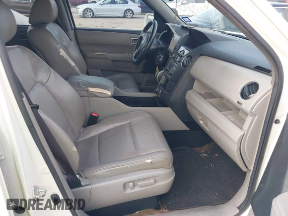 2013 Honda Pilot Touring with VIN 5FNYF3H95DB031130, listed as a IAAI auction lot 42669792 with 255,280 mi miles and . Bid and sale history available at DreamBid. Image 5.
