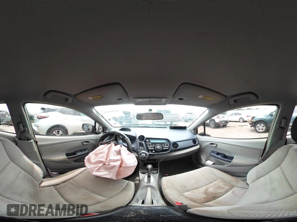 2010 Honda Insight EX z VIN JHMZE2H72AS023404, wystawiony jako IAAI lot #42505042 z przebiegiem Nie podano mil oraz . Historia ofert i sprzedaży dostępna na DreamBid. Obrazek 17.