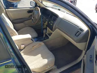 1998 Toyota Avalon XL with VIN 4T1BF18BXWU267131, listed as a IAAI auction lot 41518513 with 208,023 mi miles and . Bid and sale history available at DreamBid. Image 5.