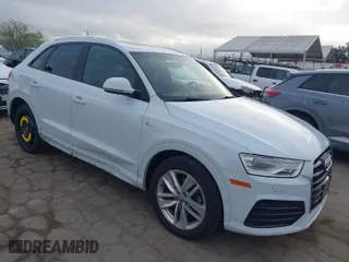 2018 Audi Q3 Premium with VIN WA1BCCFSXJR028356, listed as a IAAI auction lot 41761544 with 82,877 mi miles. Bid and sale history available at carsss.com. Image 1.