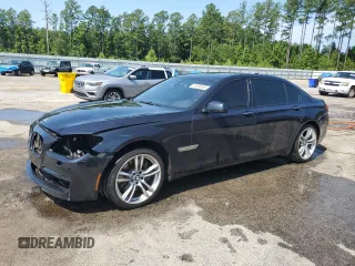 2012 BMW 7 Series 750Li with VIN WBAKB8C56CDX21023, listed as a Copart auction lot 61988955 with 145,022 mi miles and Salvage title. Bid and sale history available at DreamBid. Image 1.