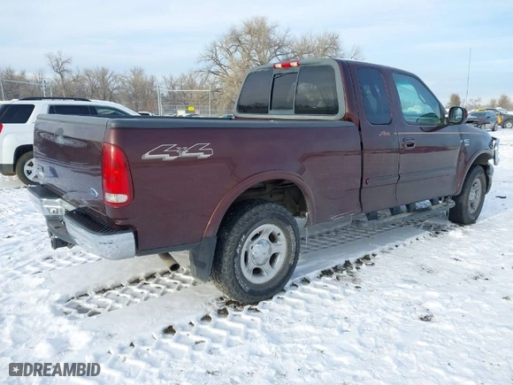 2000 Ford F-150 XL with VIN 1FTRX18L2YNA50128, listed as a IAAI auction lot 40956879 with 1 mi miles. Bid and sale history available at carsss.com. Image 4.