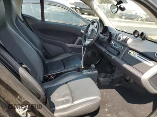 2014 Smart fortwo Passion z VIN WMEEJ9AA0EK788192, wystawiony jako Copart lot #68584984 z przebiegiem Nie podano mil oraz Szkoda całkowita • Salvage title. Historia ofert i sprzedaży dostępna na DreamBid. Obrazek 10.