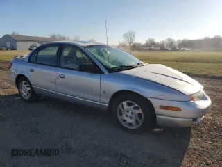 2002 Saturn SL с VIN 1G8ZK52752Z126601, выставлен на аукционе Copart как лот 49425725 с пробегом 138 098 миль миль и Списание • Salvage title. История ставок и продаж доступна на DreamBid. Изображение 4.