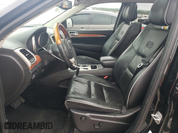 2013 Jeep Grand Cherokee Overland with VIN 1C4RJECG5DC528650, listed as a Copart auction lot 51581684 with 141,050 mi miles and Clean Title. Bid and sale history available at carsss.com. Image 7.