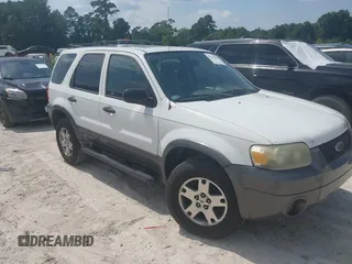 2005 Ford Escape XLT with VIN 1FMCU03165KA57025, listed as a IAAI auction lot 42569198 with 240,065 mi miles and . Bid and sale history available at DreamBid. Image 1.