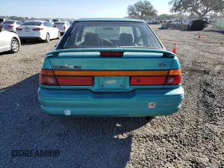 1995 Ford Escort z VIN 3FASP11J4SR216881, wystawiony jako Copart lot #82966474 z przebiegiem 172 397 mil mil oraz Szkoda całkowita • Salvage title. Historia ofert i sprzedaży dostępna na DreamBid. Obrazek 6.
