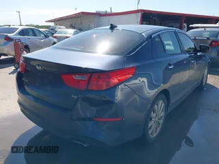 2015 Kia Optima LX with VIN 5XXGM4A71FG400128, listed as a IAAI auction lot 42106109 with 185,667 mi miles and . Bid and sale history available at carsss.com. Image 4.