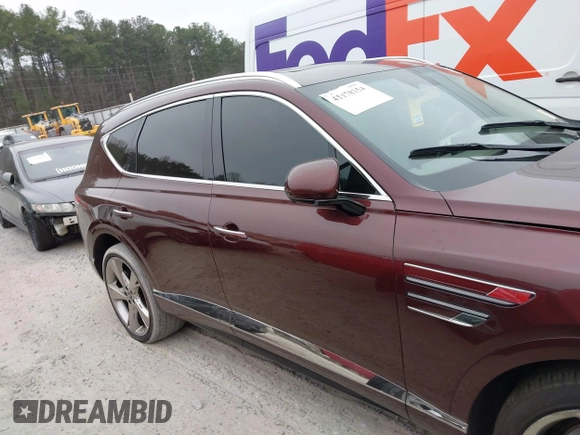 2021 Genesis GV80 with VIN KMUHCESC1MU031056, listed as a IAAI auction lot 41178354 with 95,749 mi miles and . Bid and sale history available at DreamBid. Image 12.
