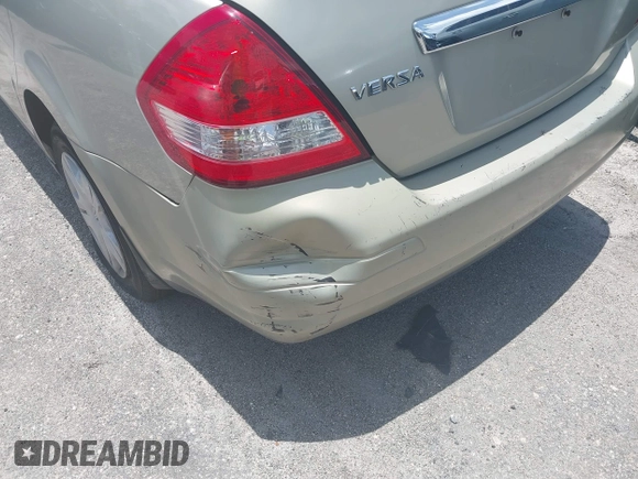 2007 Nissan Versa SL with VIN 3N1BC11E97L410876, listed as a IAAI auction lot 42266271 with 145,571 mi miles and . Bid and sale history available at DreamBid. Image 14.