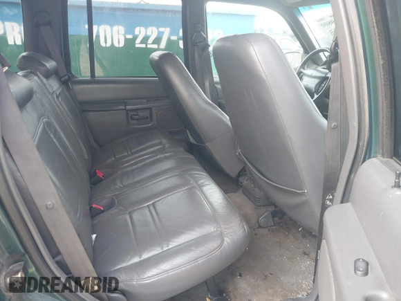 1999 Ford Explorer XLT z VIN 1FMZU32E7XZB57306, wystawiony jako IAAI lot #41519800 z przebiegiem 226 932 mil mil oraz . Historia ofert i sprzedaży dostępna na DreamBid. Obrazek 8.