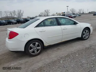 2005 Pontiac G6 GT with VIN 1G2ZH548554124234, listed as a IAAI auction lot 42053402 with 124,699 mi miles. Bid and sale history available at carsss.com. Image 4.