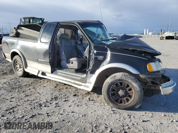 2002 Ford F-150 XL with VIN 1FTRX17LX2NB11895, listed as a Copart auction lot 47850565 with Not provided miles and Salvage title. Bid and sale history available at DreamBid. Image 4.