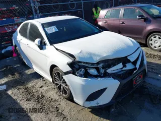 2018 Toyota Camry LE with VIN 4T1B11HK3JU658046, listed as a IAAI auction lot 41222583 with 325,249 mi miles. Bid and sale history available at carsss.com. Image 1.