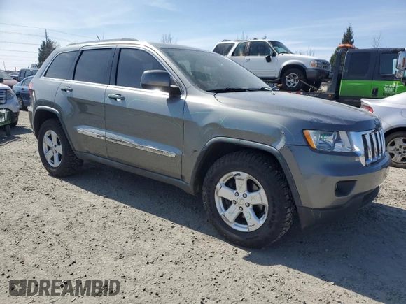 2011 Jeep Grand Cherokee Laredo with VIN 1J4RR4GGXBC702300, listed as a Copart auction lot 49736255 with 163,684 mi miles and Salvage Title. Bid and sale history available at carsss.com. Image 4.