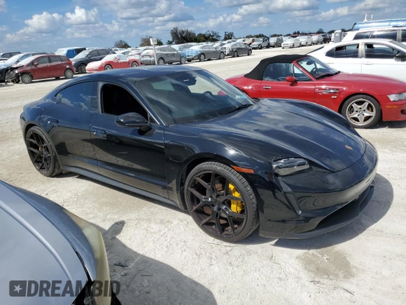 2022 Porsche Taycan with VIN WP0AA2Y16NSA11528, listed as a Copart auction lot 77314554 with 19,910 mi miles and Non repairable. Bid and sale history available at DreamBid. Image 4.