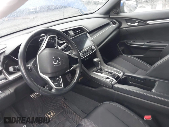 2021 Honda Civic Sport with VIN 2HGFC2F87MH554620, listed as a IAAI auction lot 41743596 with 52,327 mi miles and . Bid and sale history available at DreamBid. Image 5.