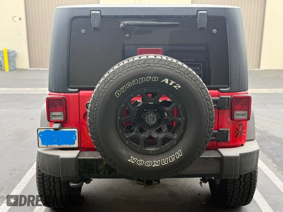 2015 Jeep Wrangler Sport with VIN 1C4AJWAG0FL750098, listed as a IAAI auction lot 41266454 with 77,115 mi miles. Bid and sale history available at carsss.com. Image 12.