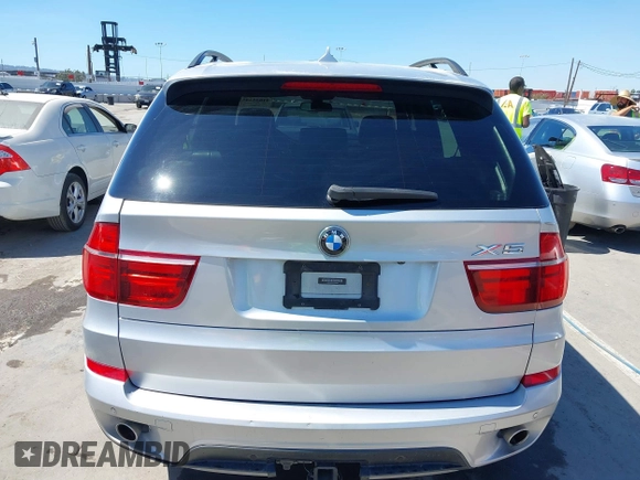 2012 BMW X5 35d z VIN 5UXZW0C5XCL665504, wystawiony jako IAAI lot #41835285 z przebiegiem 134 245 mil mil oraz . Historia ofert i sprzedaży dostępna na DreamBid. Obrazek 16.